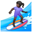 Woman Surfing: Dark Skin Tone on Samsung