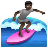 Surfer: Dark Skin Tone on WhatsApp