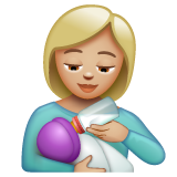 Woman Feeding Baby: Medium-Light Skin Tone on WhatsApp