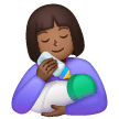 Woman Feeding Baby: Medium-Dark Skin Tone on Samsung