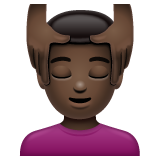 Man Getting Massage: Dark Skin Tone on WhatsApp