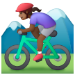 Woman Mountain Biking: Medium-Dark Skin Tone on Samsung