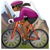 Woman Mountain Biking: Medium-Dark Skin Tone on WhatsApp