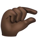 Pinching Hand: Dark Skin Tone on WhatsApp