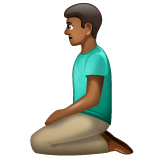 Man Kneeling: Medium-Dark Skin Tone on WhatsApp