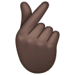 Hand With Index Finger And Thumb Crossed: Dark Skin Tone on Samsung